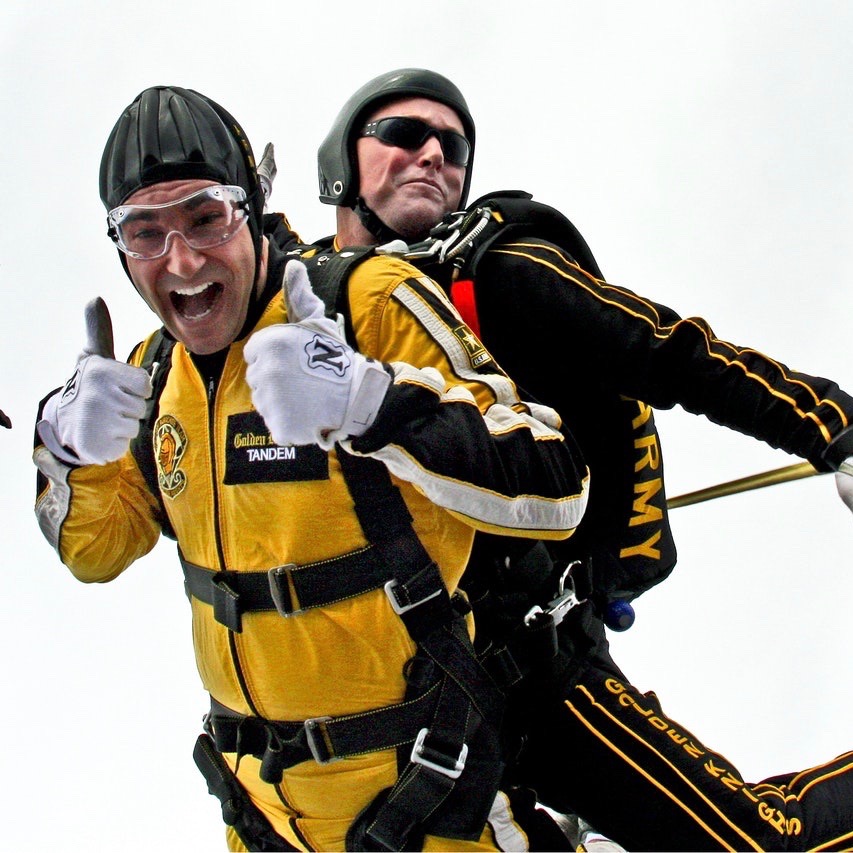 man-in-yellow-jumpsuit-and-man-in-black-jumpsuit-sky-diving-39608